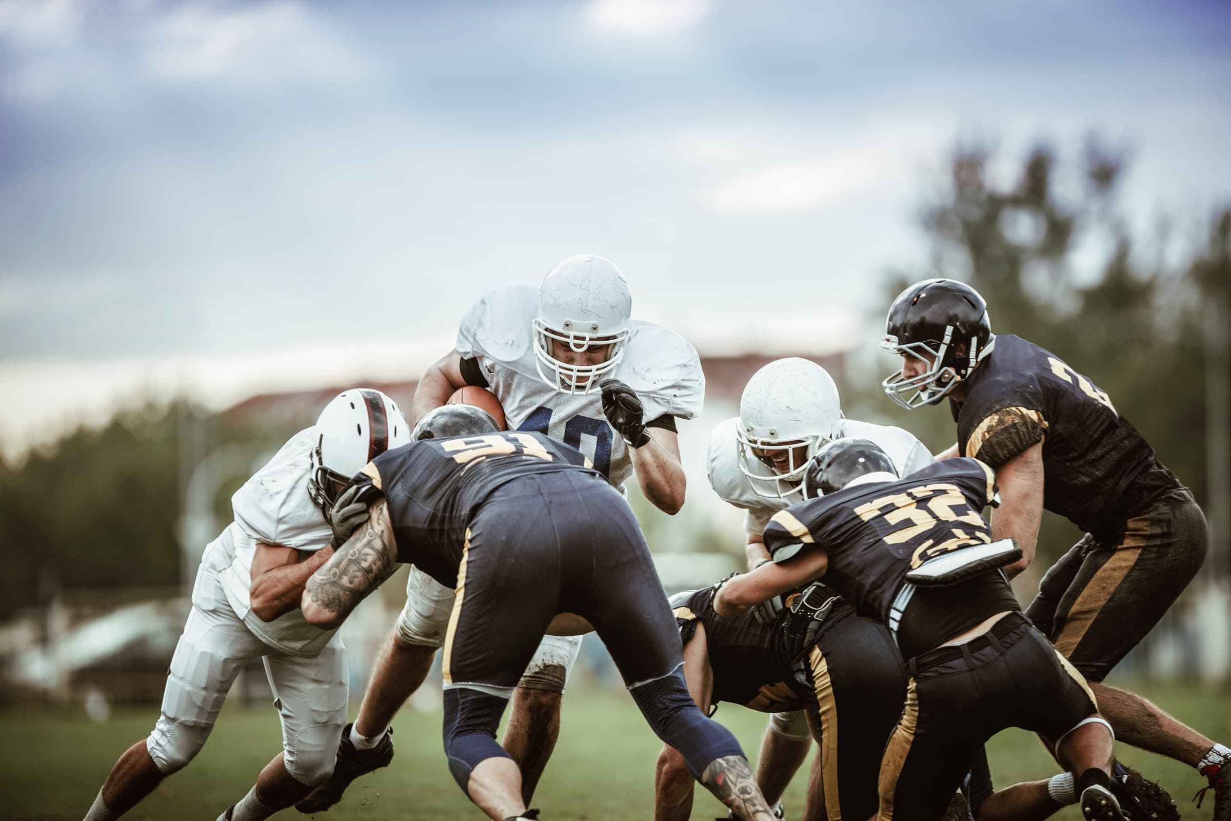 High school football players at the line of scrimmage